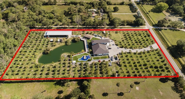 2810 F Rd, Loxahatchee Groves, FL 33470 - view of rural area featuring property parcel outlined and a large body of water
