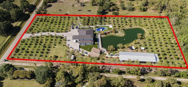 2810 F Rd, Loxahatchee Groves, FL 33470 - aerial view of property and surrounding area with property parcel outlined, a large body of water, and rural landscape