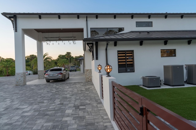 2810 F Rd, Loxahatchee Groves, FL 33470 - parking at dusk featuring driveway and a yard