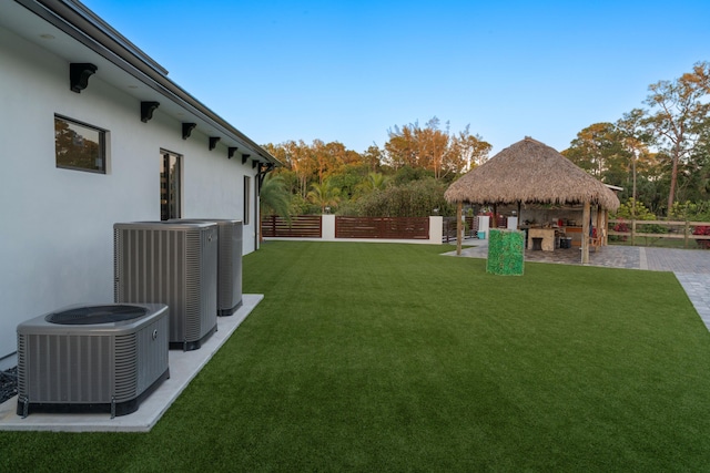 2810 F Rd, Loxahatchee Groves, FL 33470 - fenced backyard featuring a gazebo and a patio area