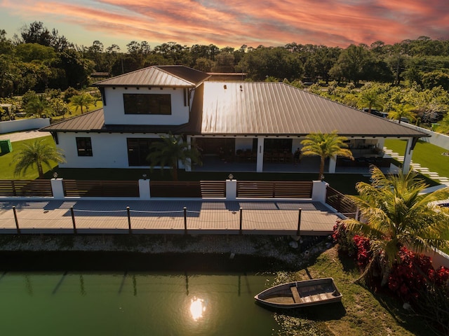 2810 F Rd, Loxahatchee Groves, FL 33470 - back of house featuring a metal roof and a standing seam roof