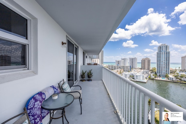 137 Golden Isles Dr Unit 1605, Hallandale Beach, FL 33009 - balcony with a water view and a view of city