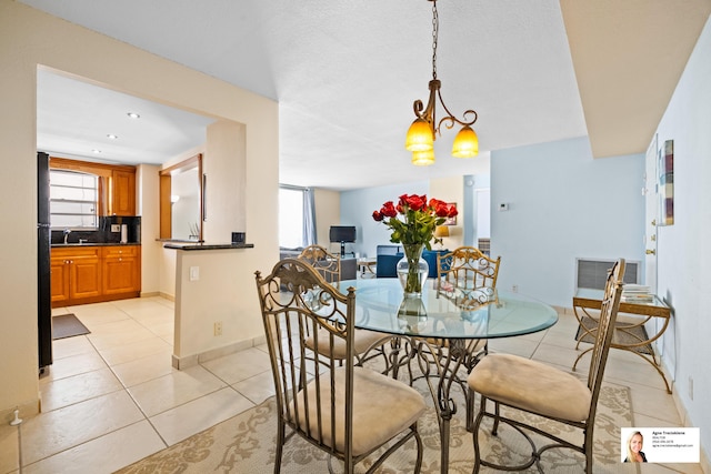 137 Golden Isles Dr Unit 501, Hallandale Beach, FL 33009 - dining space featuring light tile patterned flooring, a chandelier, and recessed lighting