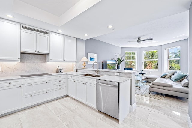 500 S US Highway 1 Unit 201, Jupiter, FL 33477 - kitchen with stainless steel dishwasher, a sink, open floor plan, a peninsula, and visible vents