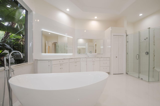 8280 Woodsmuir Dr, Palm Beach Gardens, FL 33412 - full bath with a stall shower, recessed lighting, vanity, a freestanding tub, and tile patterned floors