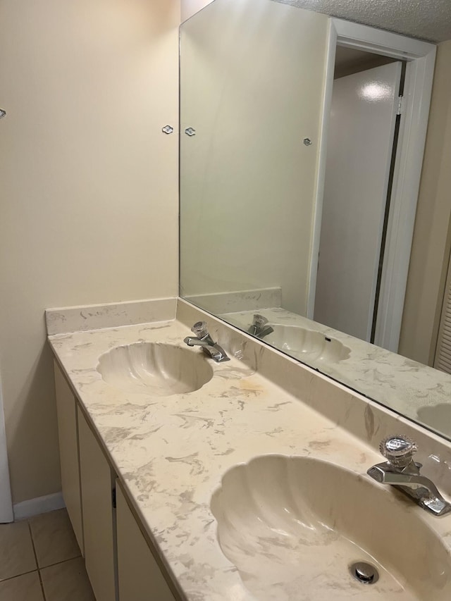 3529 Englewood Dr Unit 313, Lake Worth, FL 33467 - bathroom featuring double vanity and tile patterned floors