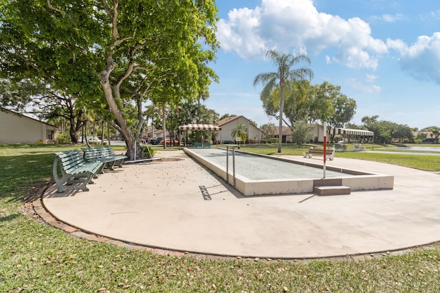 3529 Englewood Dr Unit 313, Lake Worth, FL 33467 - surrounding community featuring a game area and a yard