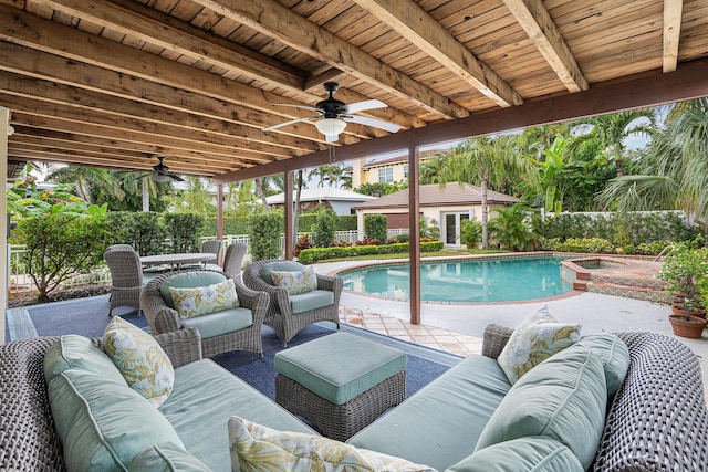 view of swimming pool with a patio, an outdoor living space, a ceiling fan, and a fenced in pool