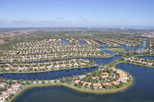 aerial view featuring a residential view and a water view