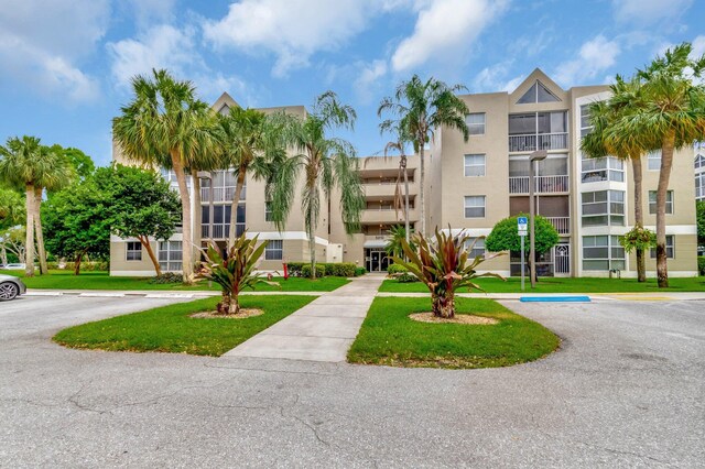 5910 Morningstar Cir Unit 401, Delray Beach, FL 33484 - view of property with uncovered parking