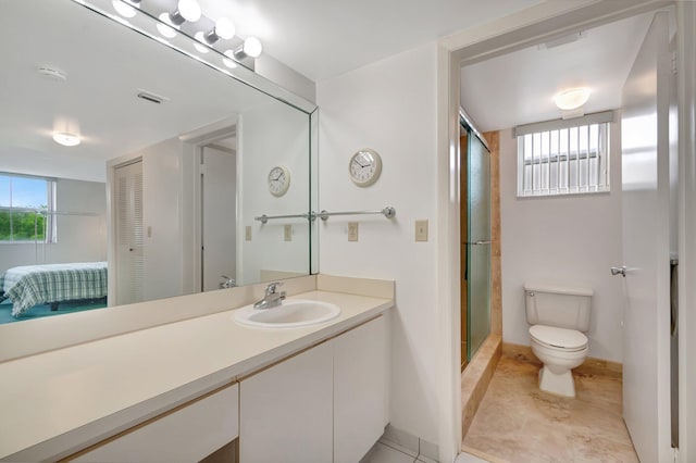 5910 Morningstar Cir Unit 401, Delray Beach, FL 33484 - bathroom with tile patterned floors, toilet, baseboards, an enclosed shower, and vanity