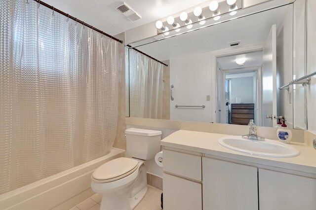5910 Morningstar Cir Unit 401, Delray Beach, FL 33484 - bathroom featuring vanity, shower / bath combination with curtain, toilet, tile patterned flooring, and visible vents