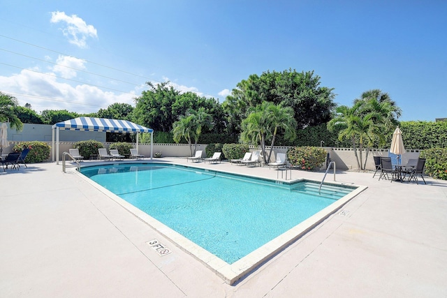 5910 Morningstar Cir Unit 401, Delray Beach, FL 33484 - pool with fence and a patio area