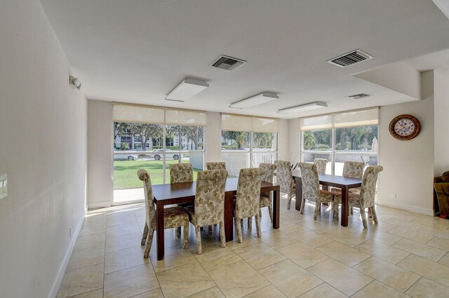 5910 Morningstar Cir Unit 401, Delray Beach, FL 33484 - dining room with baseboards and visible vents