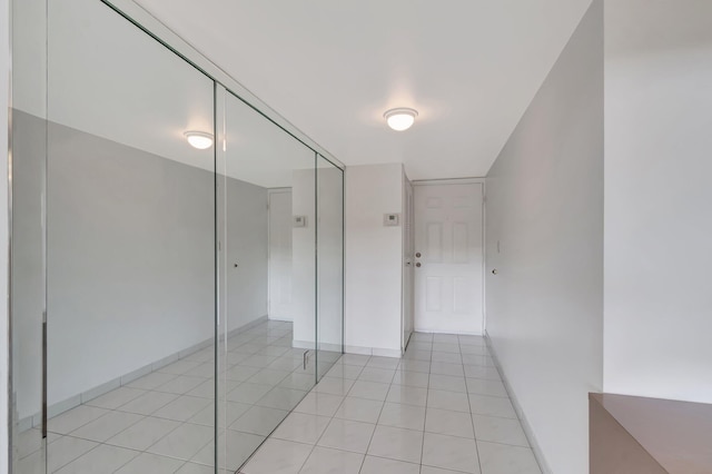 5910 Morningstar Cir Unit 401, Delray Beach, FL 33484 - interior space with baseboards, a closet, and light tile patterned floors