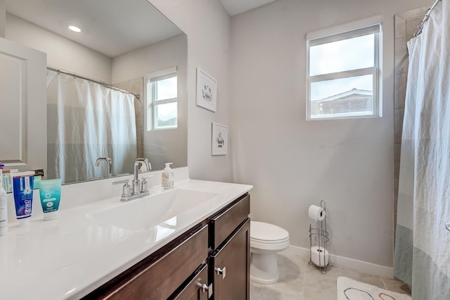 8769 Via, Mar Rosso, Lake Worth, FL 33467 - full bath featuring vanity, baseboards, toilet, tile patterned flooring, and a shower with shower curtain