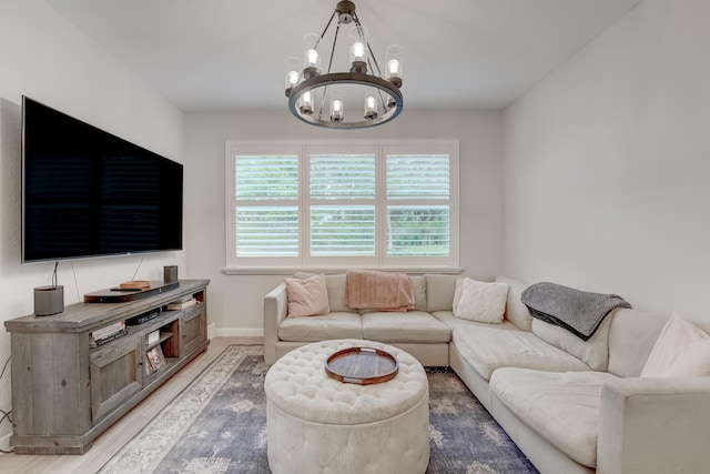 8769 Via, Mar Rosso, Lake Worth, FL 33467 - living room featuring light wood-style floors, baseboards, and an inviting chandelier
