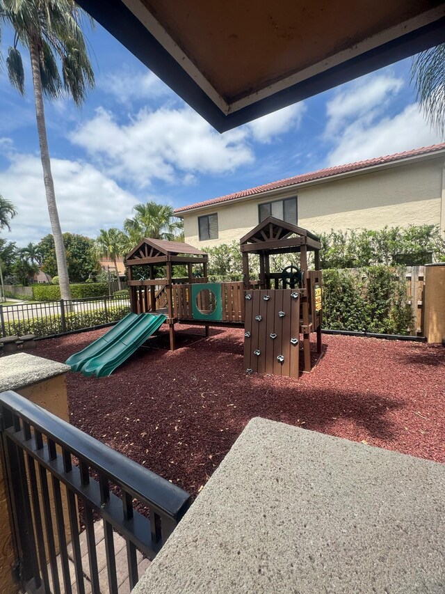 view of playground with fence