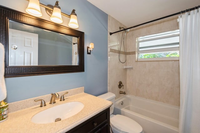bathroom featuring shower / tub combo with curtain, vanity, and toilet