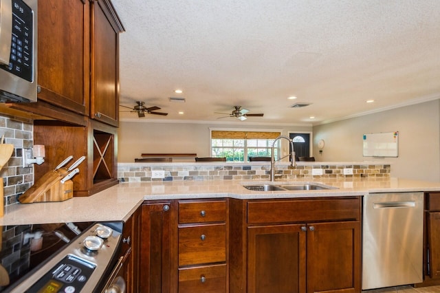 kitchen with stainless steel appliances, a sink, backsplash, and ornamental molding