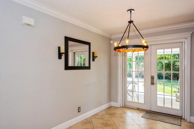 entryway featuring light tile patterned floors, french doors, crown molding, baseboards, and a chandelier