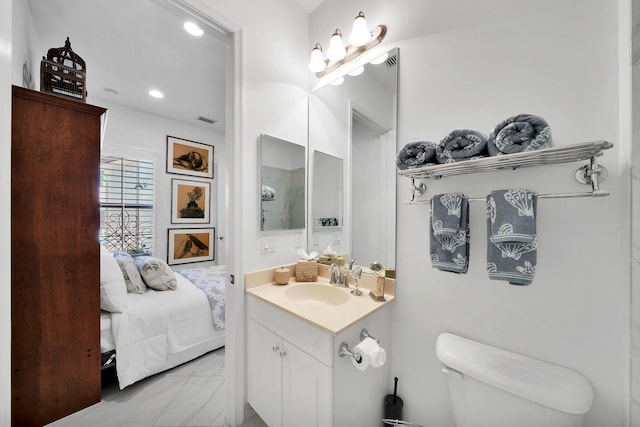 7816 Butera, Delray Beach, FL 33446 - bathroom with vanity, toilet, recessed lighting, marble look tiles, and connected bathroom