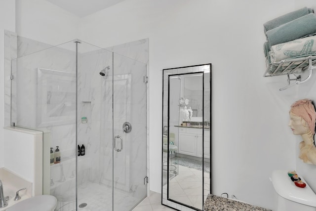 7816 Butera, Delray Beach, FL 33446 - full bathroom featuring toilet and a marble finish shower