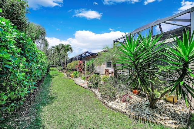 7816 Butera, Delray Beach, FL 33446 - view of green lawn featuring glass enclosure