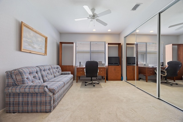 carpeted home office with ceiling fan, recessed lighting, and visible vents