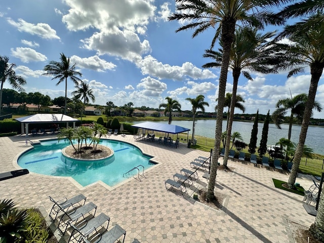 8926 Agliana Cir, Boynton Beach, FL 33472 - community pool with a water view, a gazebo, fence, and a patio area