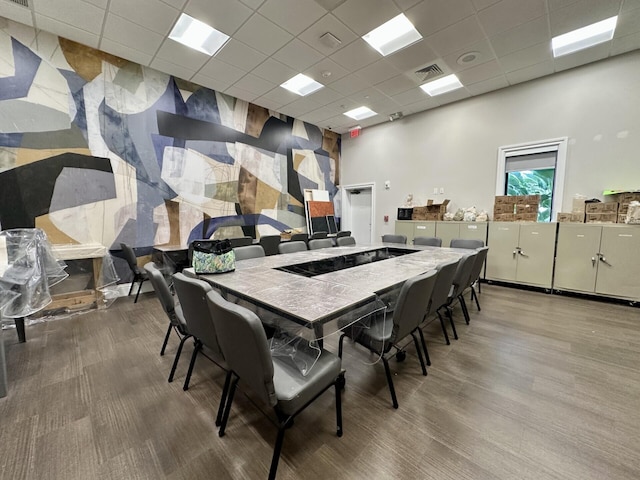 8926 Agliana Cir, Boynton Beach, FL 33472 - dining space with visible vents, a drop ceiling, and wood finished floors