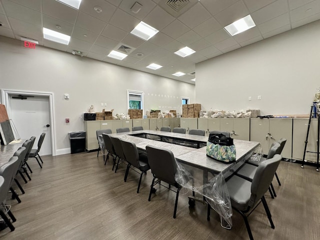 8926 Agliana Cir, Boynton Beach, FL 33472 - dining area featuring a paneled ceiling, wood finished floors, and visible vents