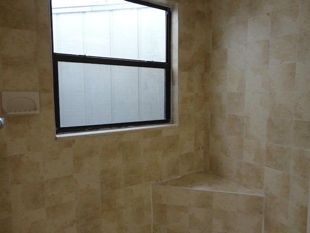 full bathroom featuring a shower stall, tile patterned flooring, and vanity