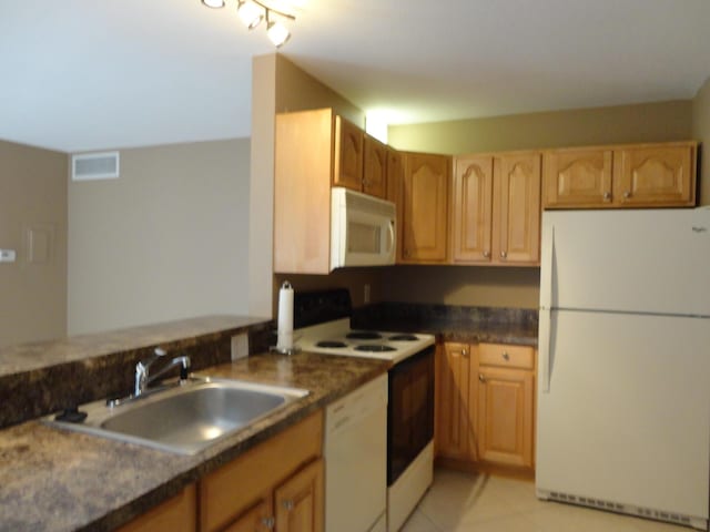 living area with visible vents and light tile patterned floors