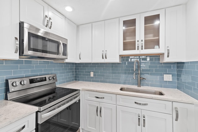 574 Monaco L, Delray Beach, FL 33446 - kitchen with stainless steel appliances and white cabinets
