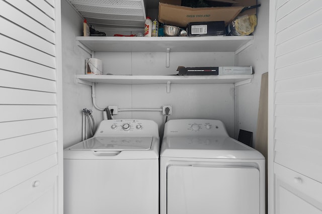 574 Monaco L, Delray Beach, FL 33446 - washroom featuring washing machine and dryer