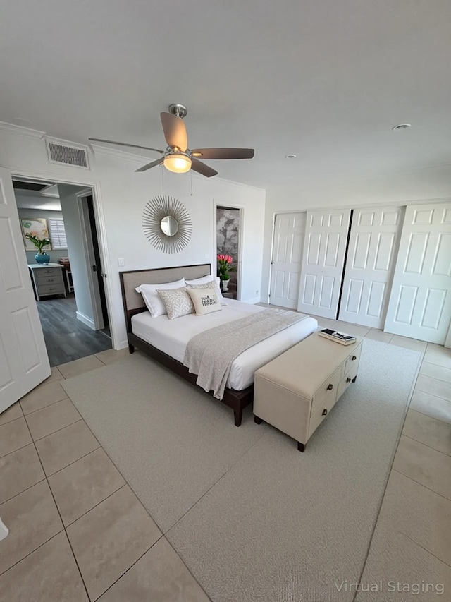 574 Monaco L, Delray Beach, FL 33446 - bedroom featuring light tile patterned floors, ceiling fan, and crown molding