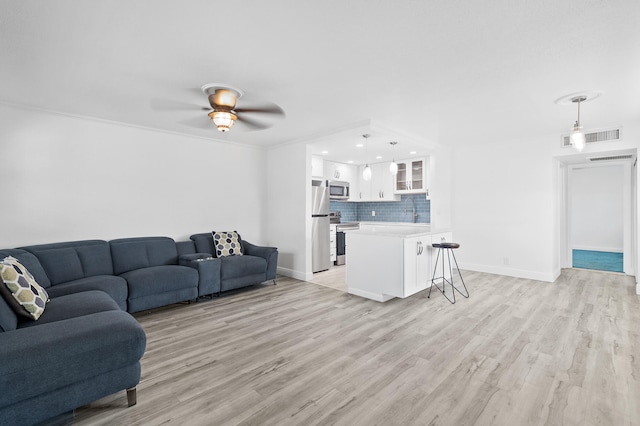 574 Monaco L, Delray Beach, FL 33446 - living area featuring recessed lighting, baseboards, a ceiling fan, and light wood-type flooring