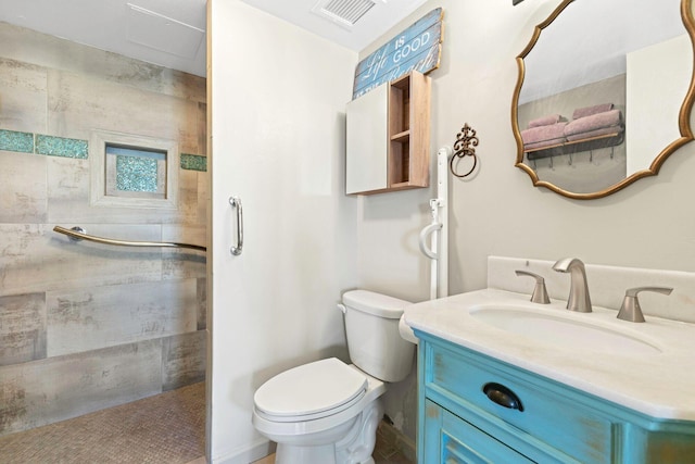 full bath with a walk in shower, visible vents, toilet, and vanity