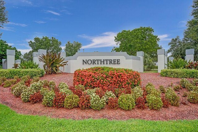 view of community sign