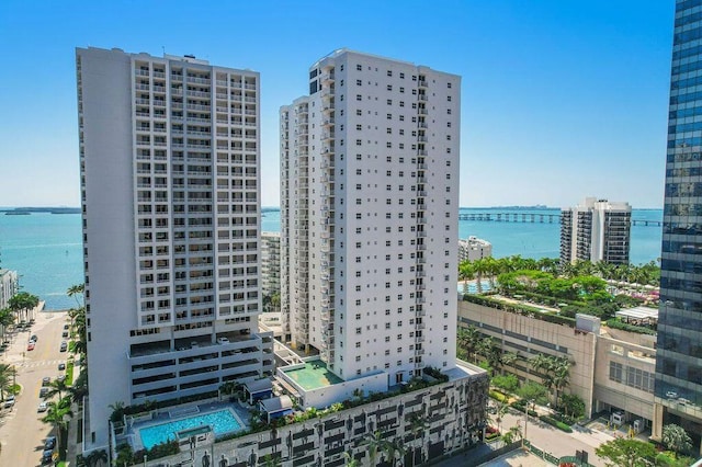 view of property featuring a view of city and a water view