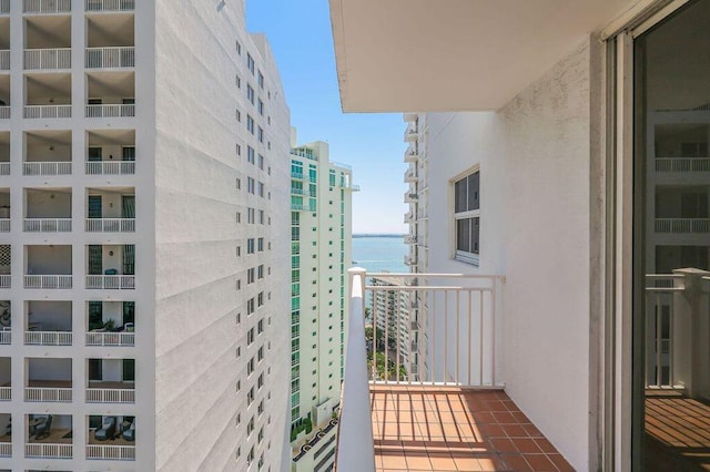 balcony featuring a water view