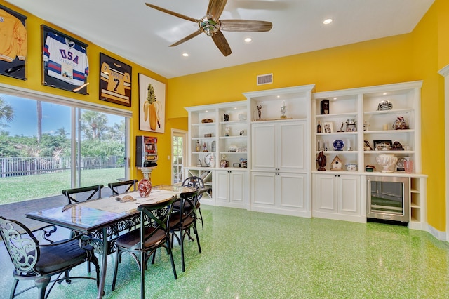 dining area featuring recessed lighting, beverage cooler, visible vents, and ceiling fan
