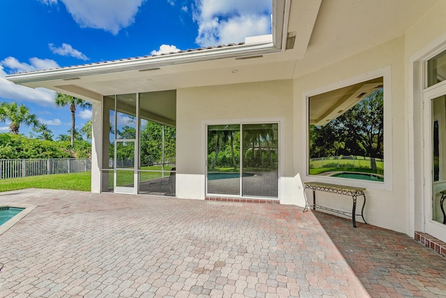 view of patio / terrace featuring fence