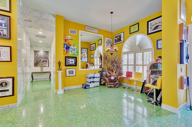 game room with baseboards and visible vents