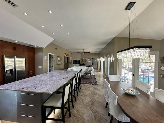 dining space featuring visible vents, recessed lighting, ceiling fan, and lofted ceiling