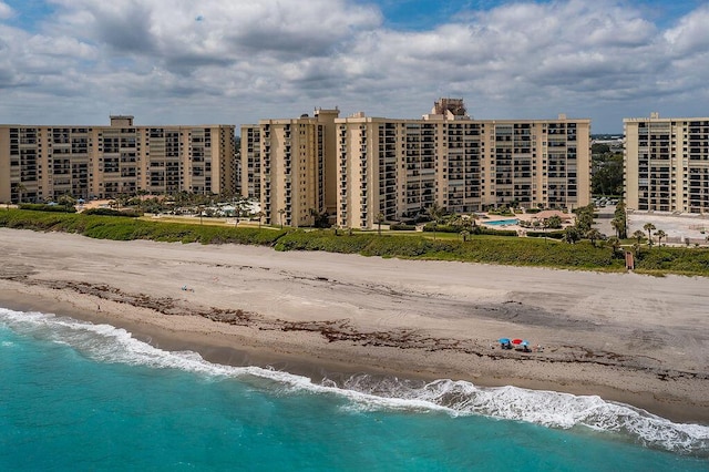 aerial view with a beach view and a water view