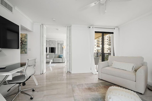 home office with visible vents, crown molding, baseboards, and a ceiling fan