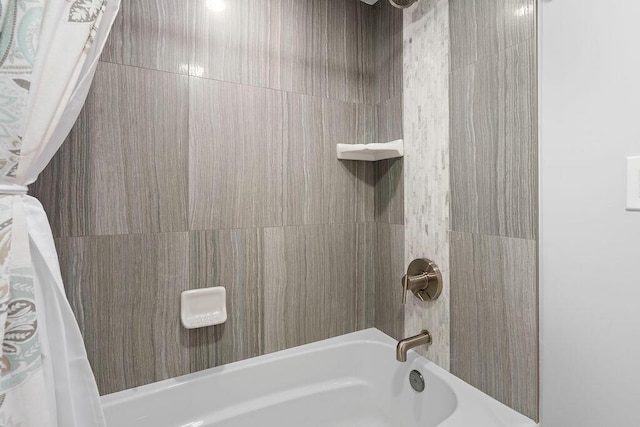 full bathroom with shower / tub combo