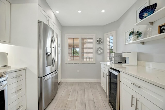 5749 Gemstone Ct Unit 404, Boynton Beach, FL 33437 - kitchen featuring beverage cooler, baseboards, stainless steel fridge, and recessed lighting
